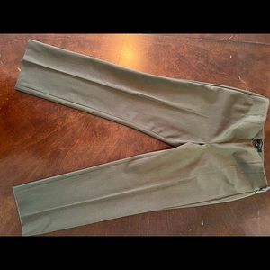 Flat front gray pants with wide zipper and darting at the waist. Inseam 27”.